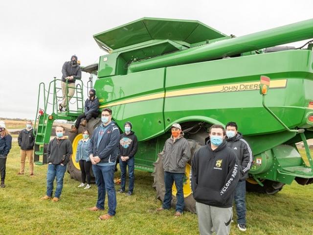 The S660 combine and corn head, donated by John Deere, allows staff and students to harvest corn and soybean research plots more efficiently.